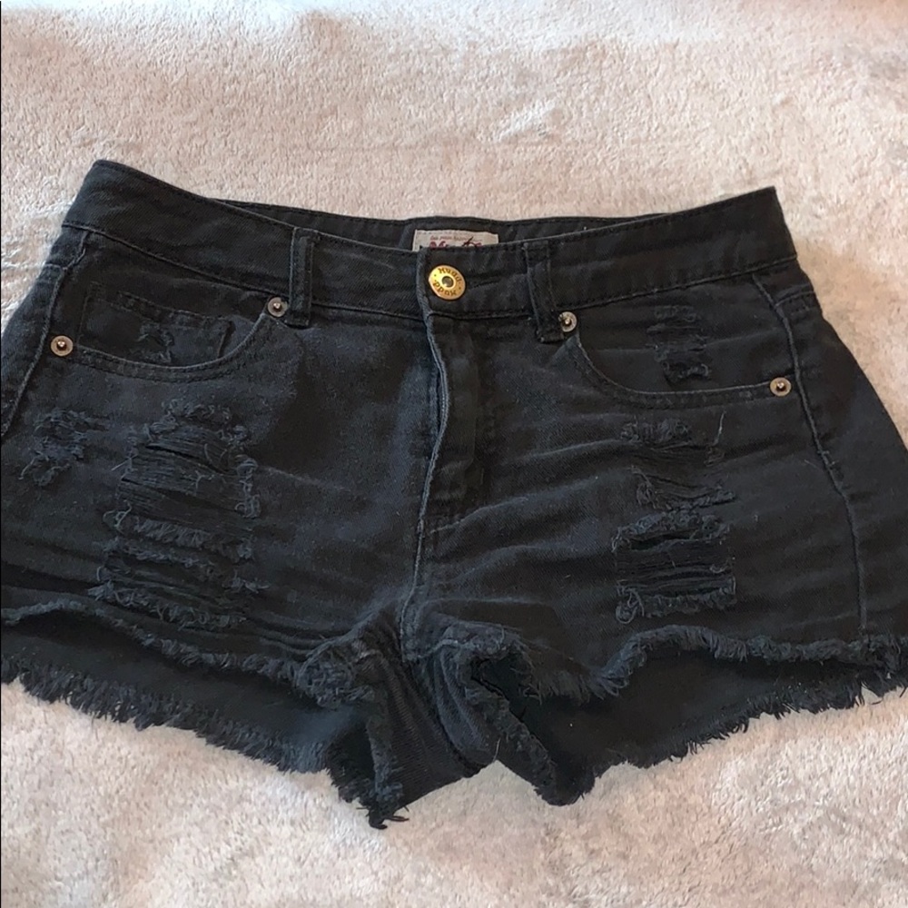 black ripped jean shorts
